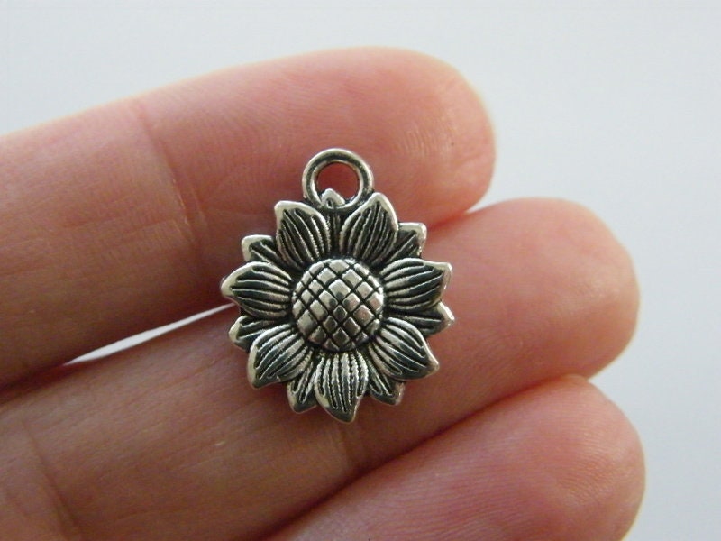 8 Sunflower charms antique silver tone F360