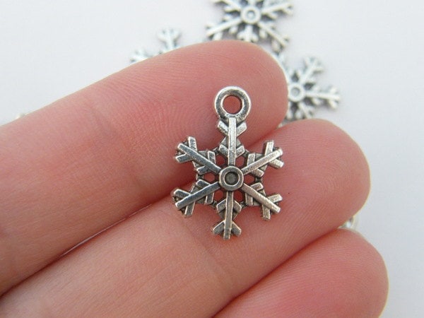 10 Snowflake Christmas charms antique silver tone SF1