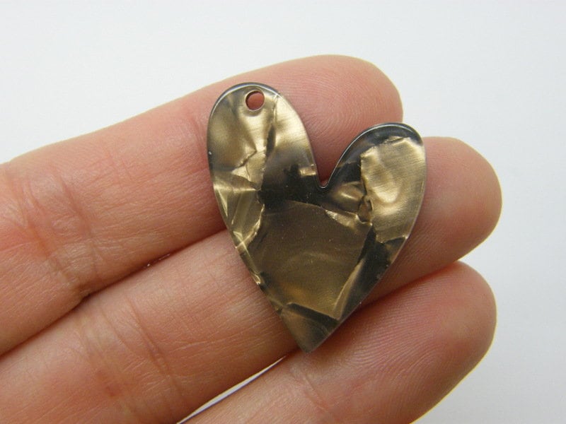 8 Beautiful  heart pendants golden black acrylic H36