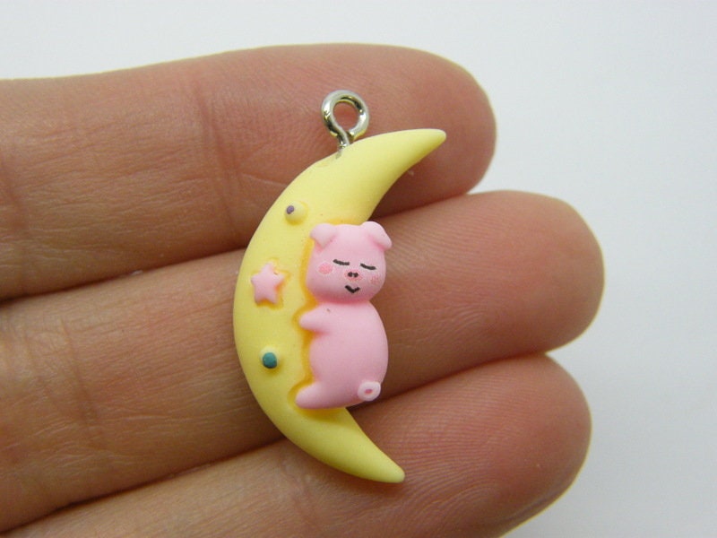 2 Moon pig charms resin M188