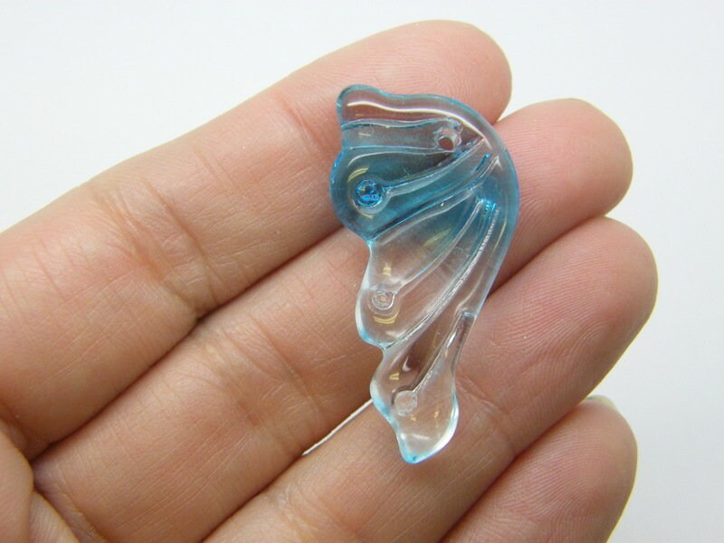 12 Butterfly wing charms clear blue  glass A691