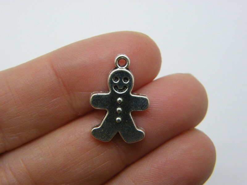 10 Gingerbread man charms antique silver tone CT122