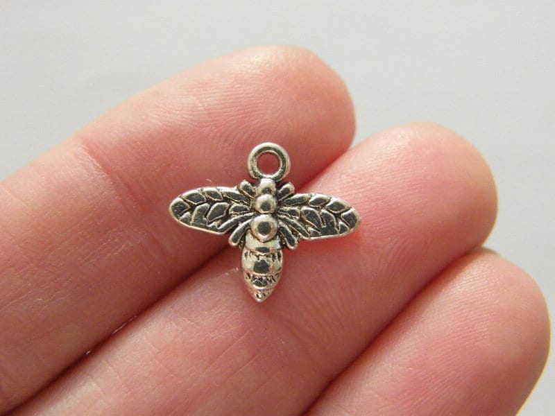 12 Bee charms antique silver tone A508