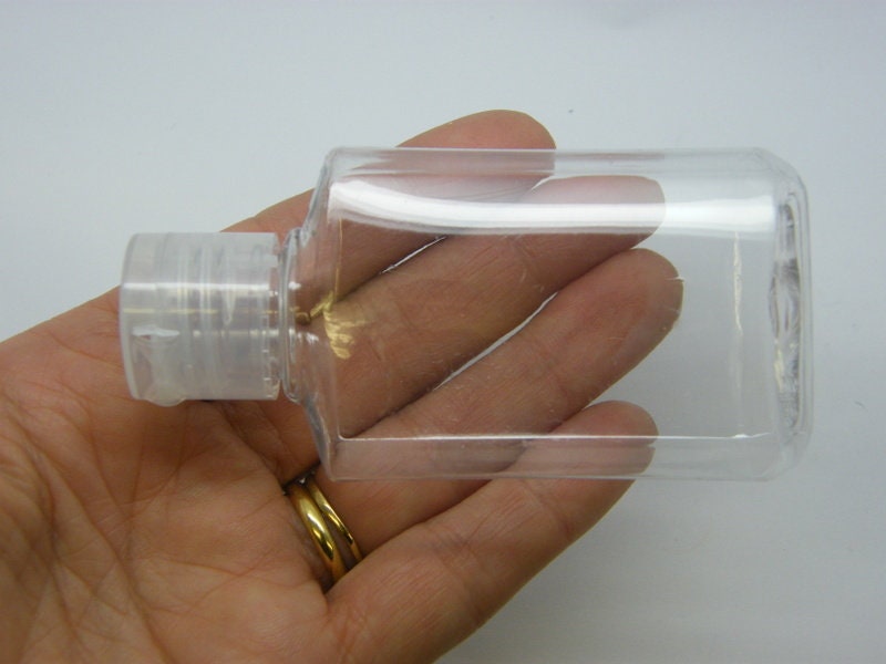 6 Clear bottles with flip cap transparent plastic