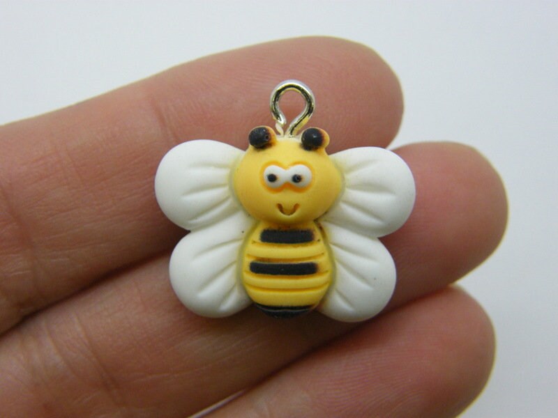 4 Bee charms yellow white resin A121