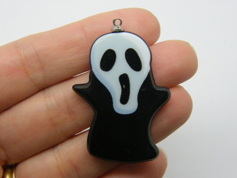 2 Ghost Halloween pendants black white resin HC652