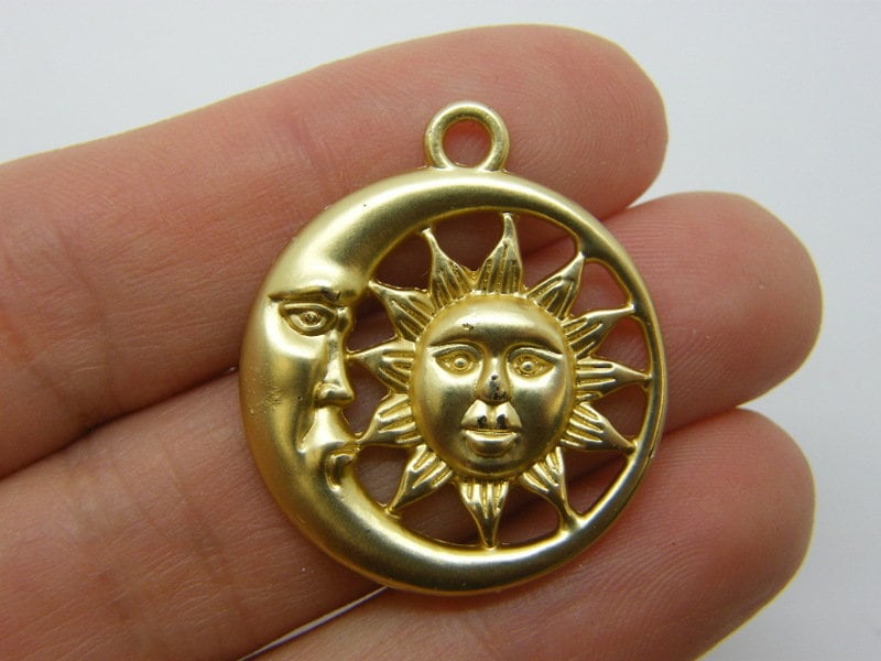 4  Moon and sun pendants matt gold tone M86