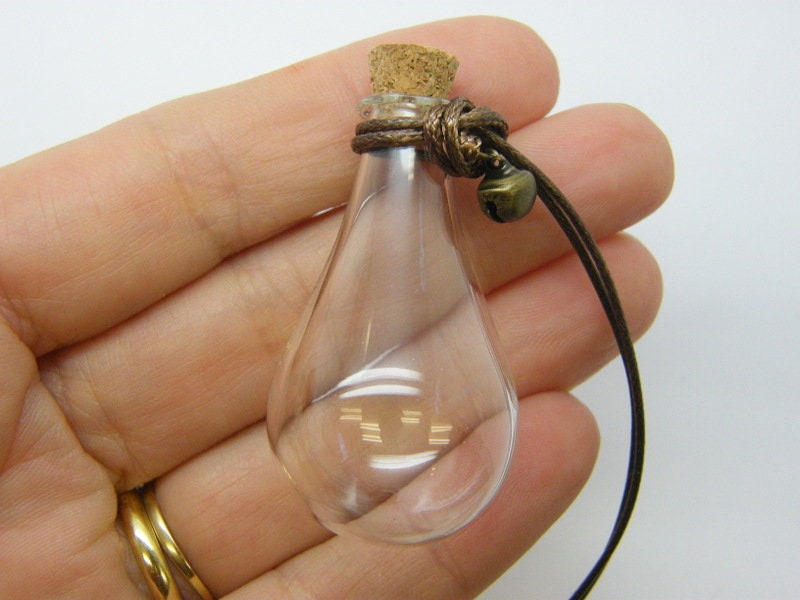 1 Oval glass bottle with removable cork brown cord GB07