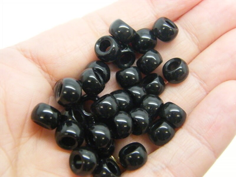 120 Barrel beads black resin AB737