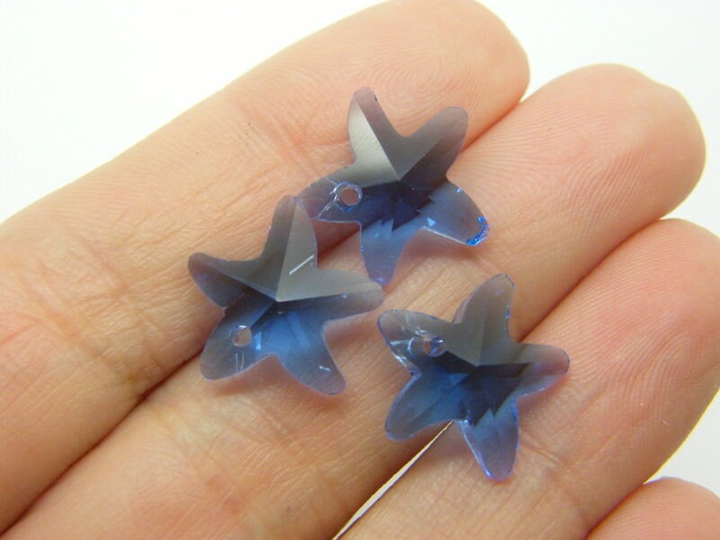 10 Starfish charms blue glass FF353