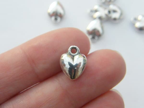 10 Heart charms tibet silver H6