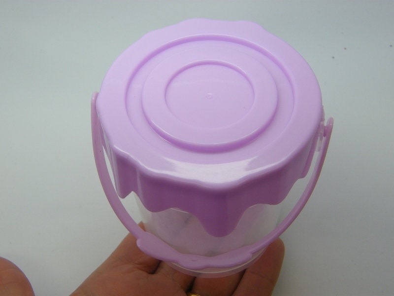 2 Dripping paint bucket storage box clear and lilac plastic
