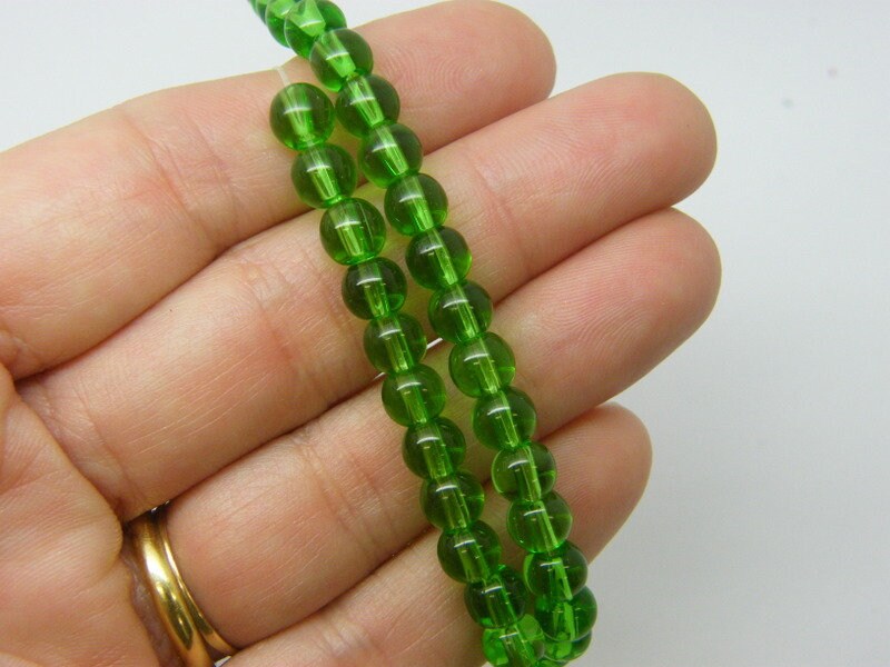 100 Green beads red 6mm glass B63
