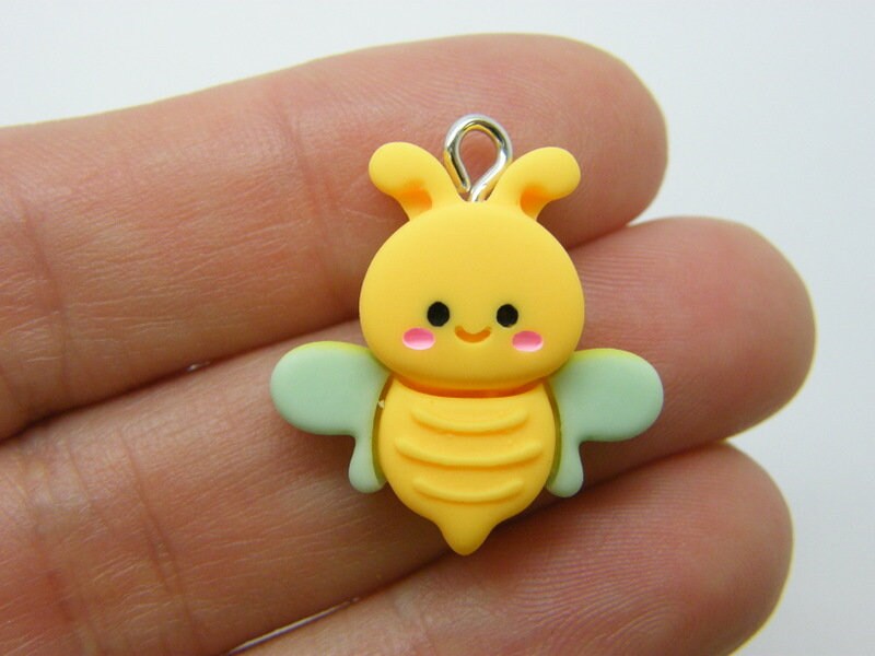 4 Bee charms yellow green resin A1018