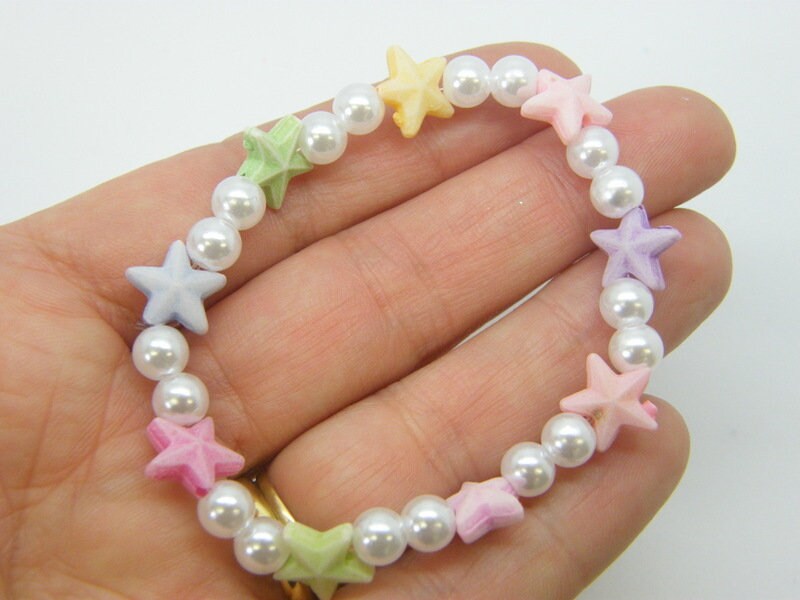 6 White shell and starfish bracelets 43mm stretchy plastic beads FS