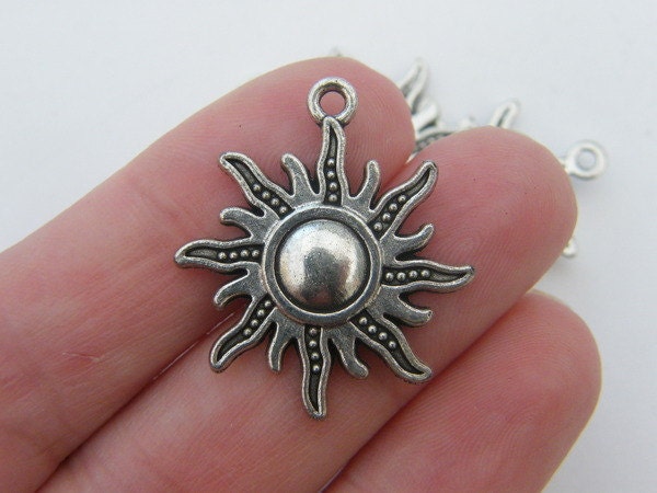 6 Sun pendants antique silver tone S63