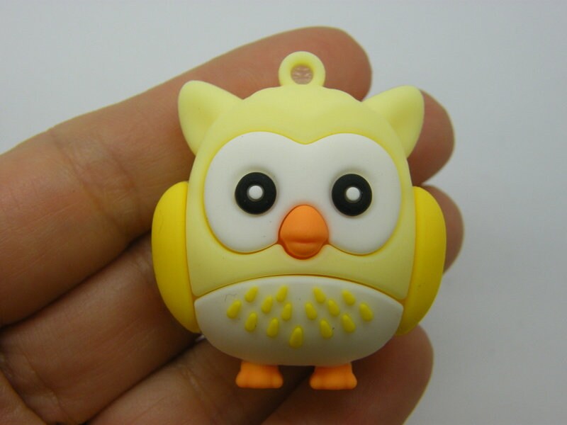4 Owl pendants yellow PVC plastic B