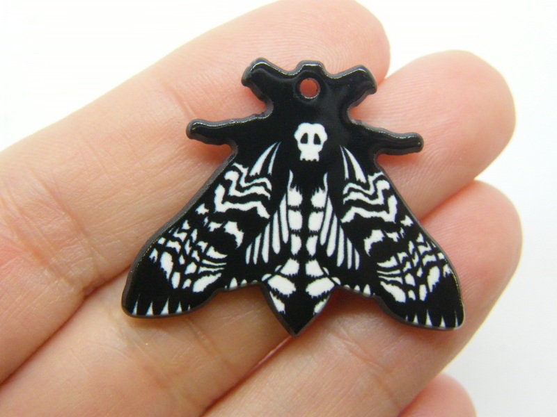 2  Moth skull pendants black white acrylic HC923