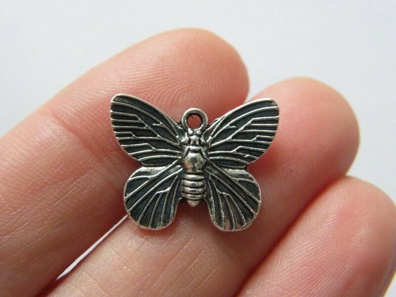 8 Butterfly charms antique silver tone A818