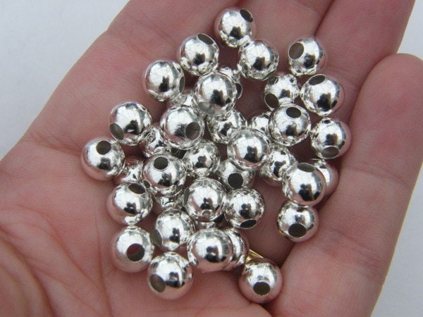 BULK 50 Spacer beads 8mm silver plated FS403