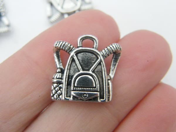10 Backpack charms antique silver tone CA48