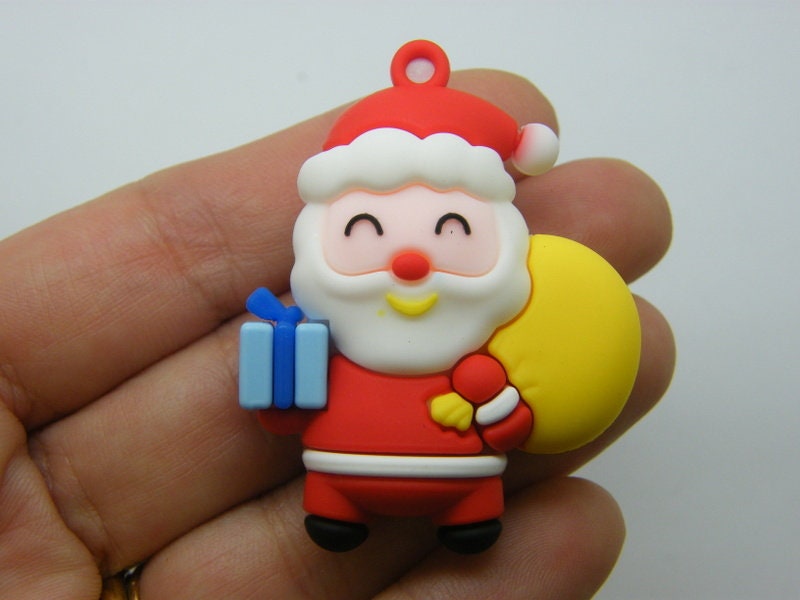 4 Santa Father Christmas pendants PVC plastic 01