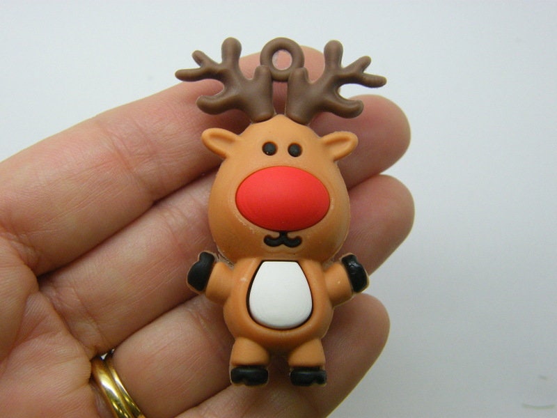 4 Reindeer Christmas pendants PVC plastic 19