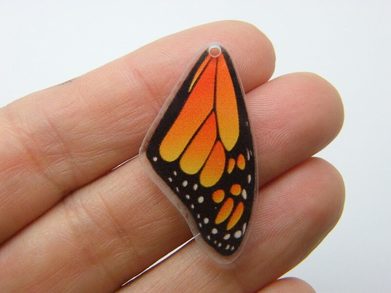 4 Butterfly insect wing charms acrylic A174
