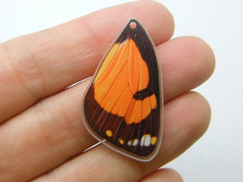 4 Butterfly insect wing charms acrylic A392