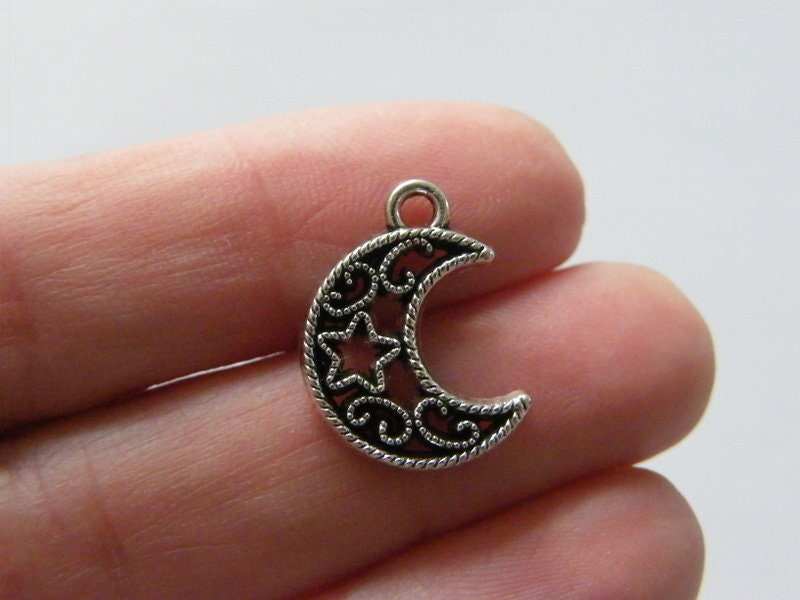 6 Moon charms antique silver tone M34