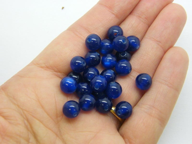 100 Royal blue cat's eye beads 8mm resin AB860