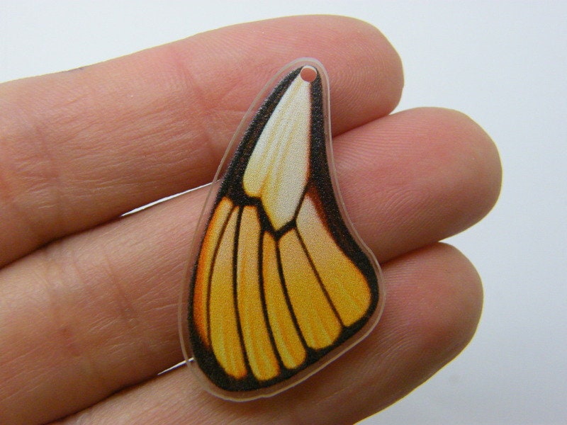 8 Butterfly insect wing charms clear yellow black acrylic A825