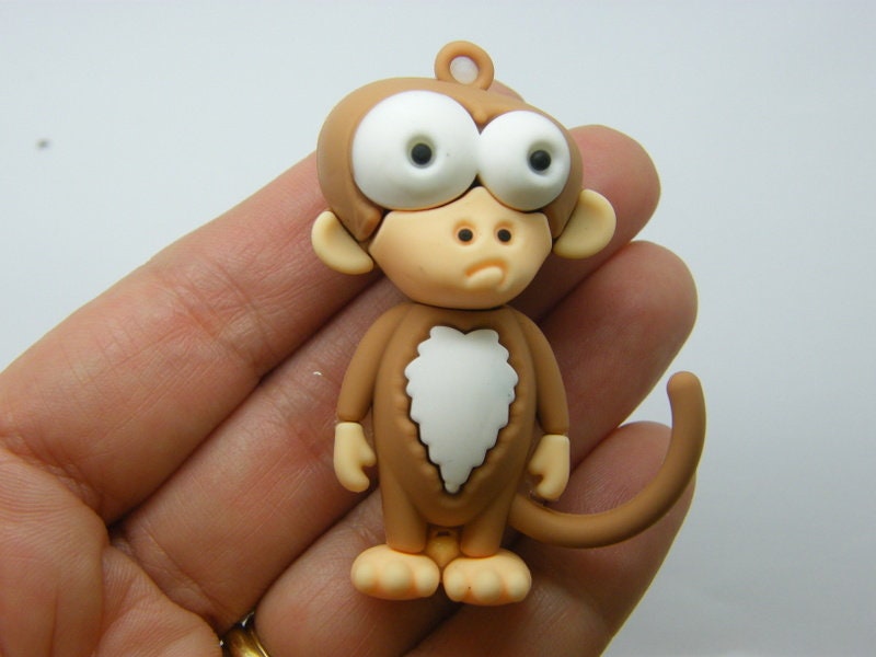 2 Monkey pendants brown PVC plastic A
