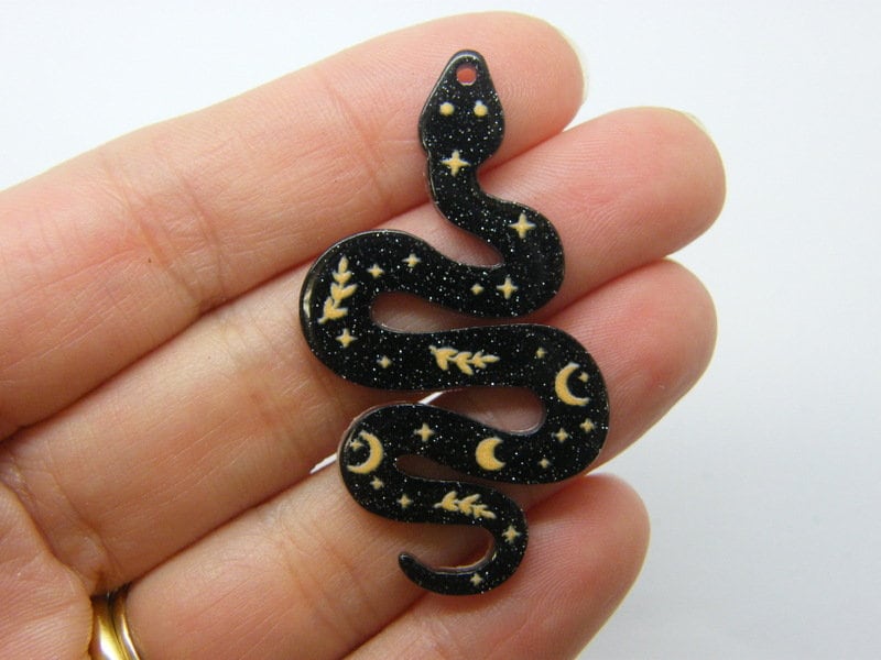 2 Snake pendants black acrylic A1107