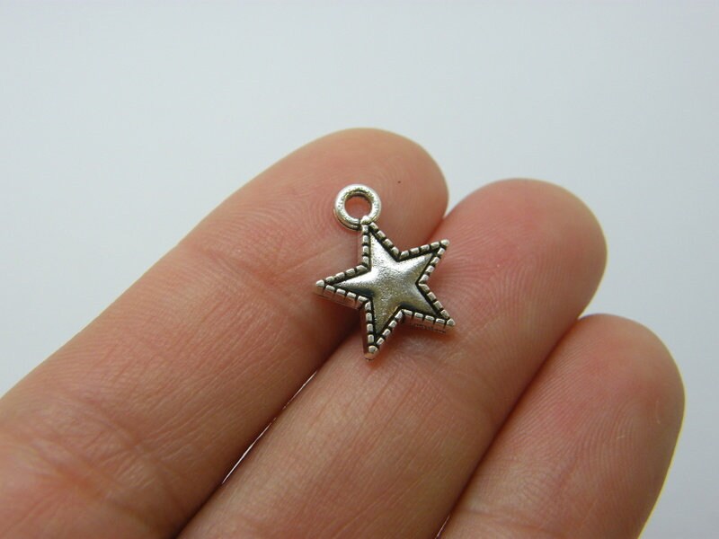 8 Star charms antique silver tone S131