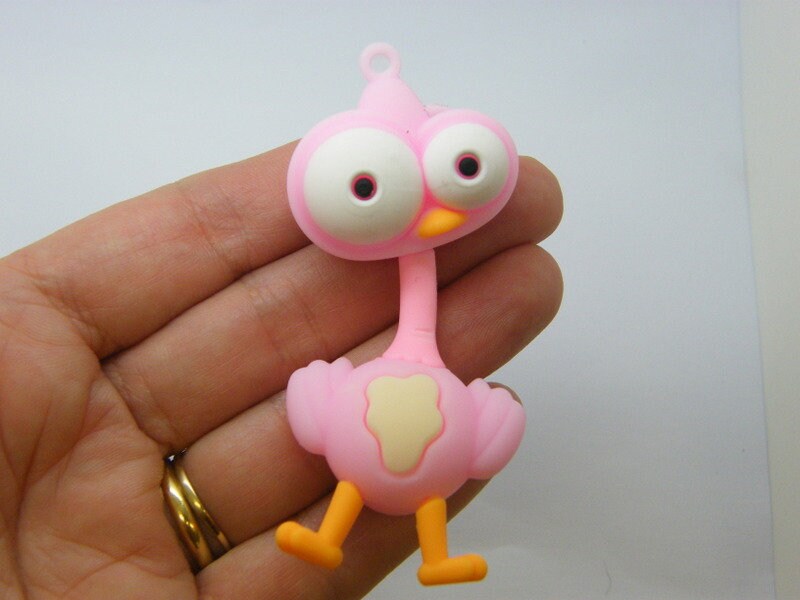 4 Ostrich pendants pink PVC plastic B