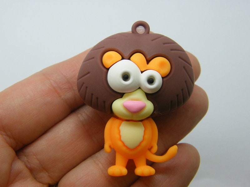 4 Lion pendants brown orange PVC plastic A