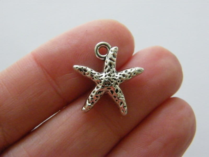 12 Starfish charms antique silver tone FF459