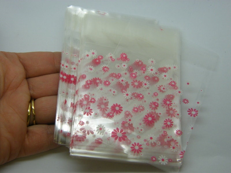 95 Pink and white daisy flower cellophane packet bags - self sealing and resealable