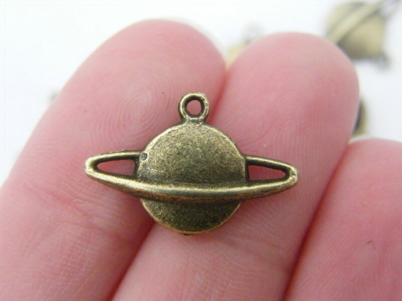 14 Saturn charms antique bronze tone S251