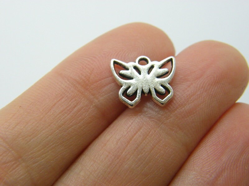 BULK 50 Butterfly charms antique silver tone A813