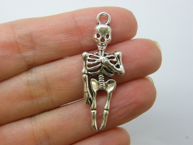 4 Skeleton pendants antique silver tone HC1100