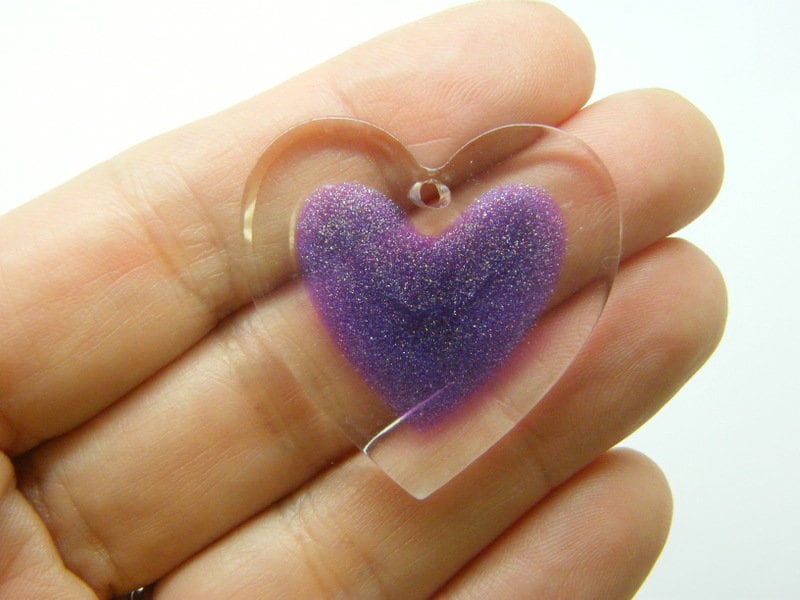 2 Heart pendants clear glitter purple resin H332