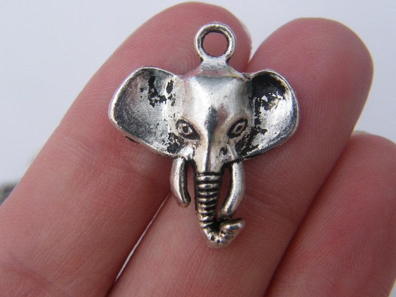 8 Elephant pendants antique silver tone A502