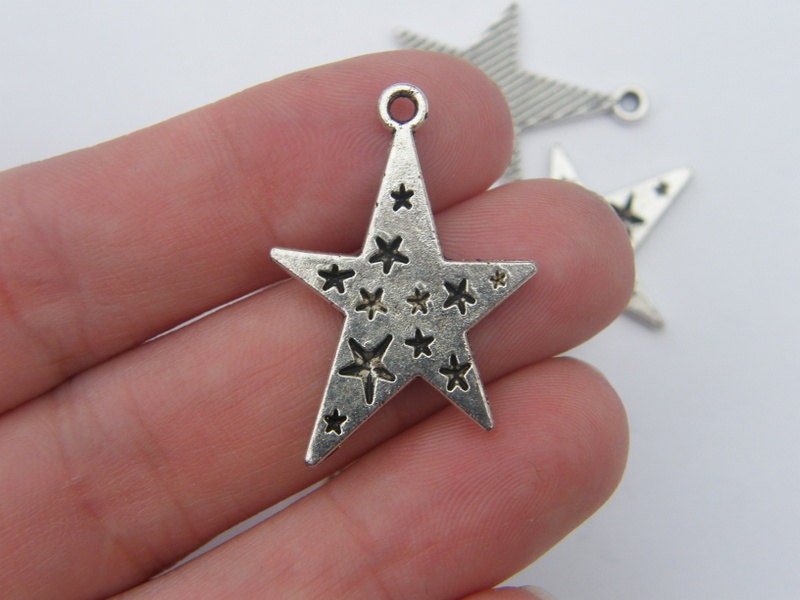 6 Star pendants antique silver tone S19