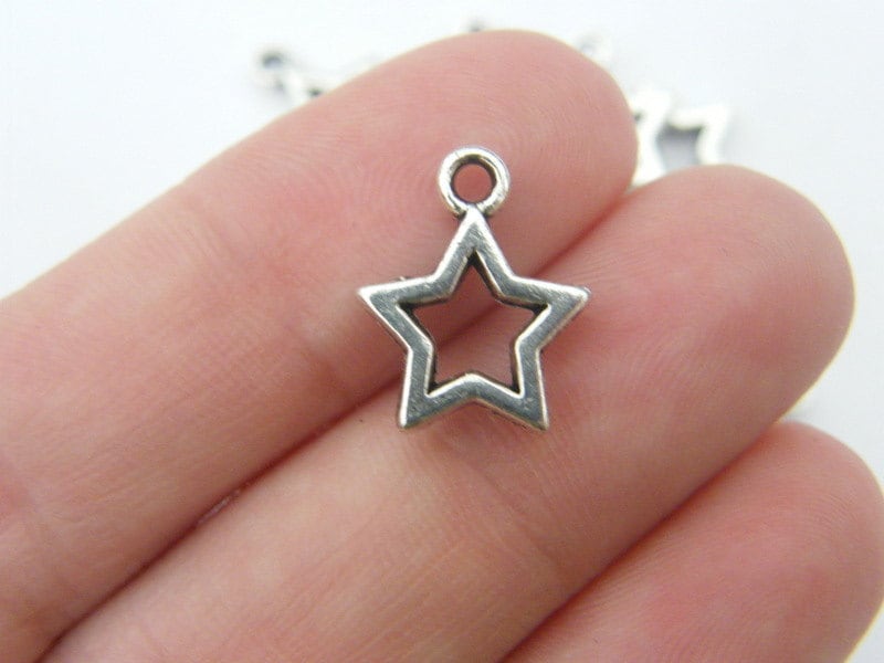 12 Star charms antique silver tone S1
