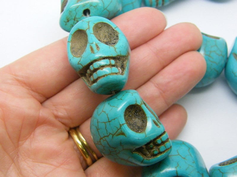 13 Super stunningly large skull beads blue HC
