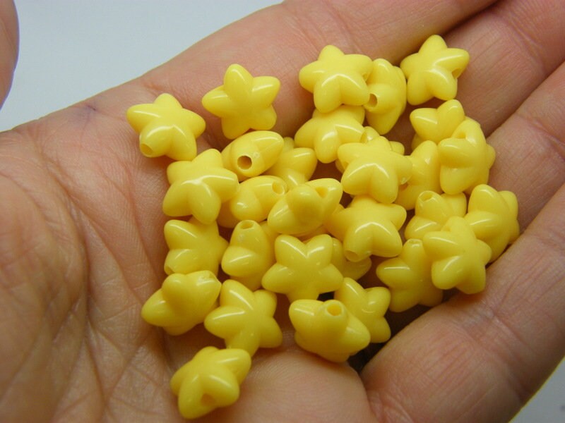 100 Star beads yellow acrylic  AB629 