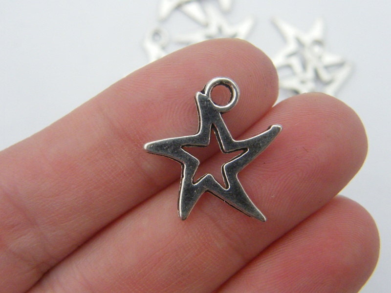 12 Star charms antique silver tone S10