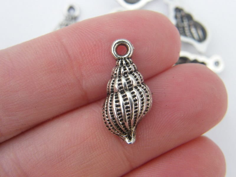10 Shell charms tibetan silver FF168